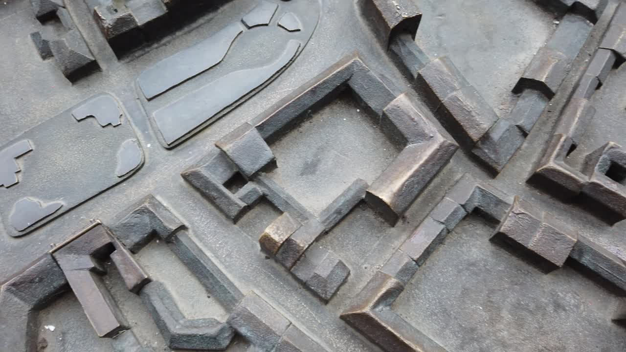 Modello di città in metallo. Modello 3D.