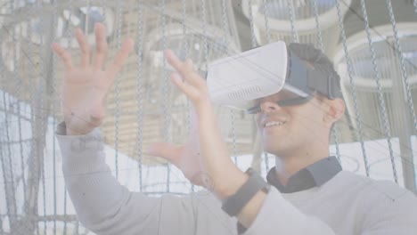 Animation-of-network-of-connections-and-statistics-over-businessman-wearing-vr-headsets
