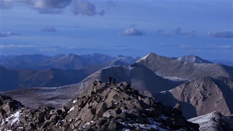 hikers top of snow covered mt mount shavano taeguache peak aerial drone colorado collegiate peaks golden hour rocky mountains huron peak mt elbert sawatch range fall autumn parallax circle motion