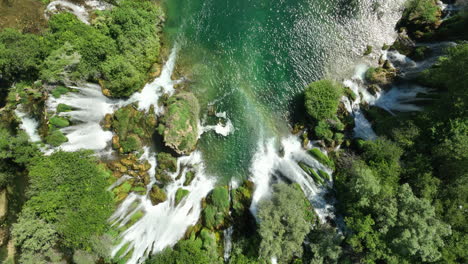 aerial view over the incredible kravica waterfall in bosnia