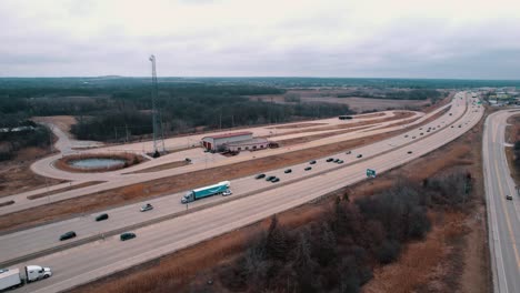 rising-aerial-of-Truck-Weigh-Station-next-to-Interstate