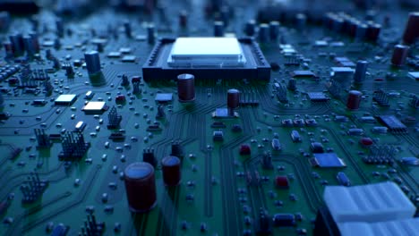 volando sobre la placa de circuito y los procesadores. animación en bucle 3d de la placa base y la cpu con dof. tecnología y concepto digital.