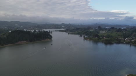 Aerial-view-from-a-drone-of-La-Piedra-del-Penol-and-the-Guatape-reservoir-near-Medellin,-Antioquia,-Colombia