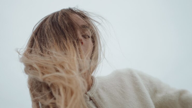 Woman with flowing blonde hair