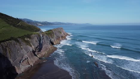 steep angled bedding planes form flysch rock on basque coast of spain