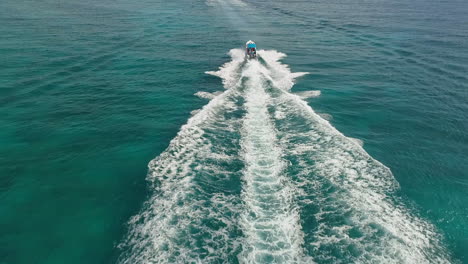 Aerial-view-of-speedboats,-driving-on-the-shallow-coast-of-Saona-Island,-in-Dominican-Republic