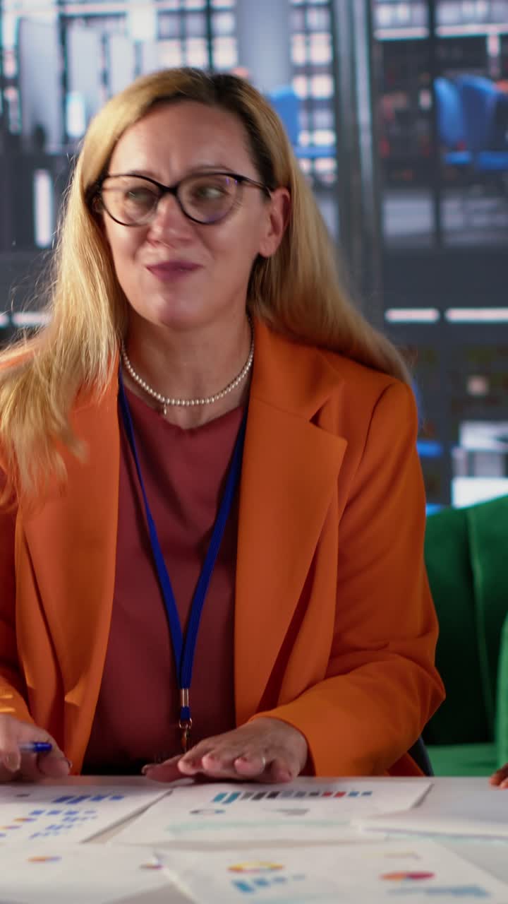 Happy Businesswoman Smiling and Collaborating with Diverse Colleagues