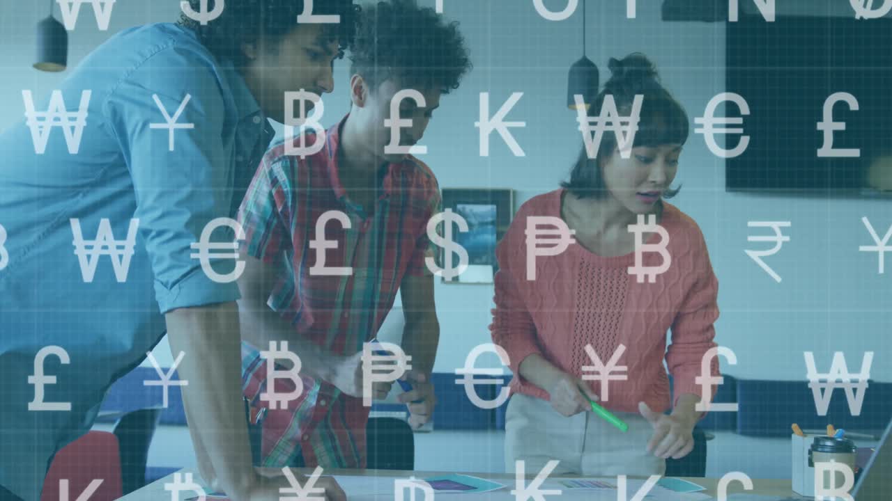 Animation of multiple currency symbols over diverse architects sharing ideas on blueprint in office