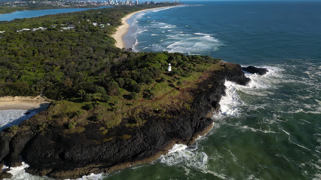 Reversing aerial over Fingal Head towards the Southern Gold Coast, Northern New South Wales, Australia