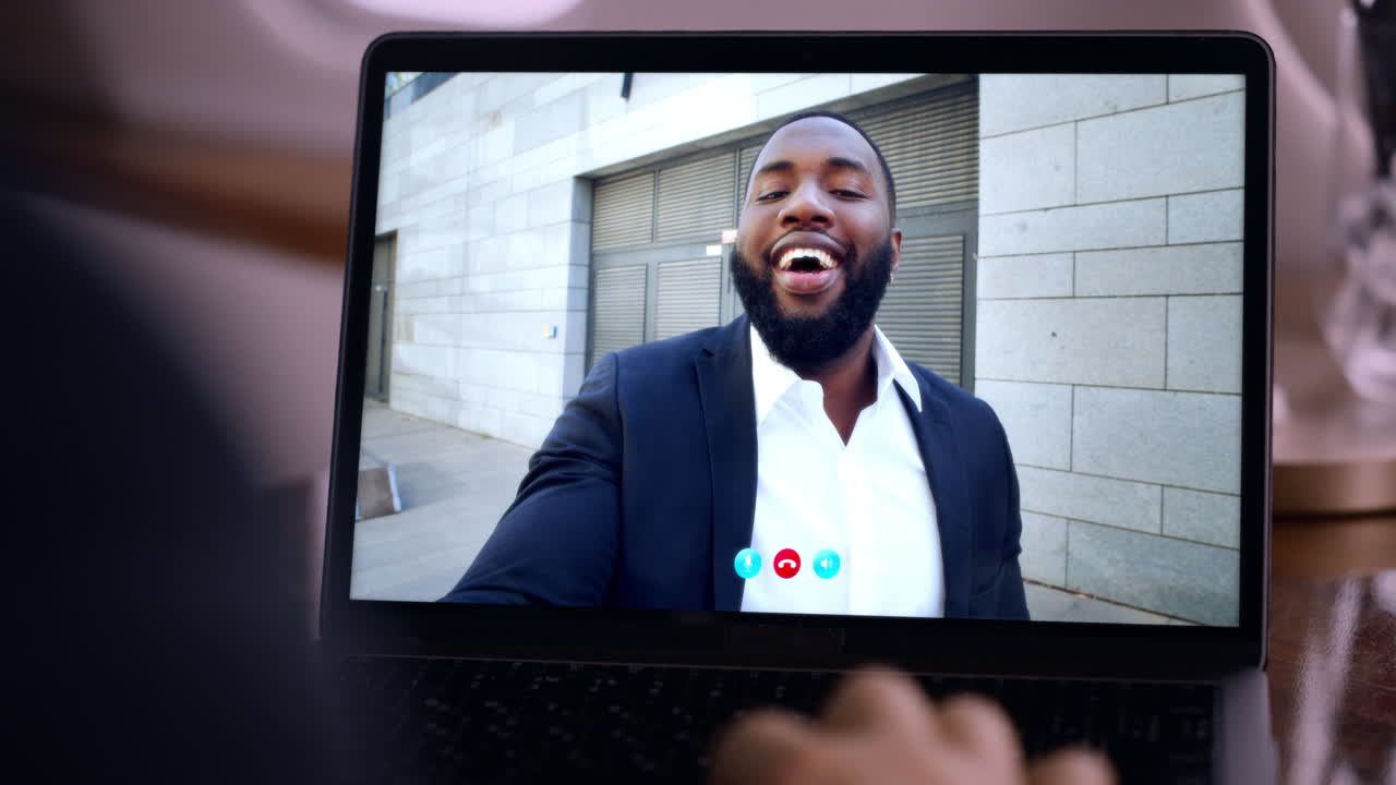 Friends calling online laptop web camera close up. Smiling businessman talking