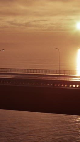 sunset over a bridge