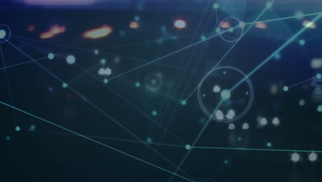 network connections and data points animation over blurred city lights at night