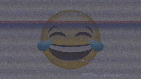 digital animation of tv static effect over laughing face emoji against grey background