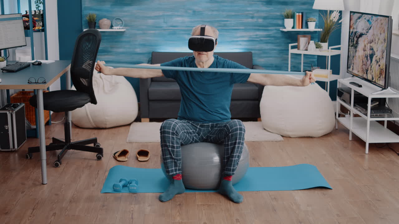 Aged person pulling resistance band and wearing vr glasses