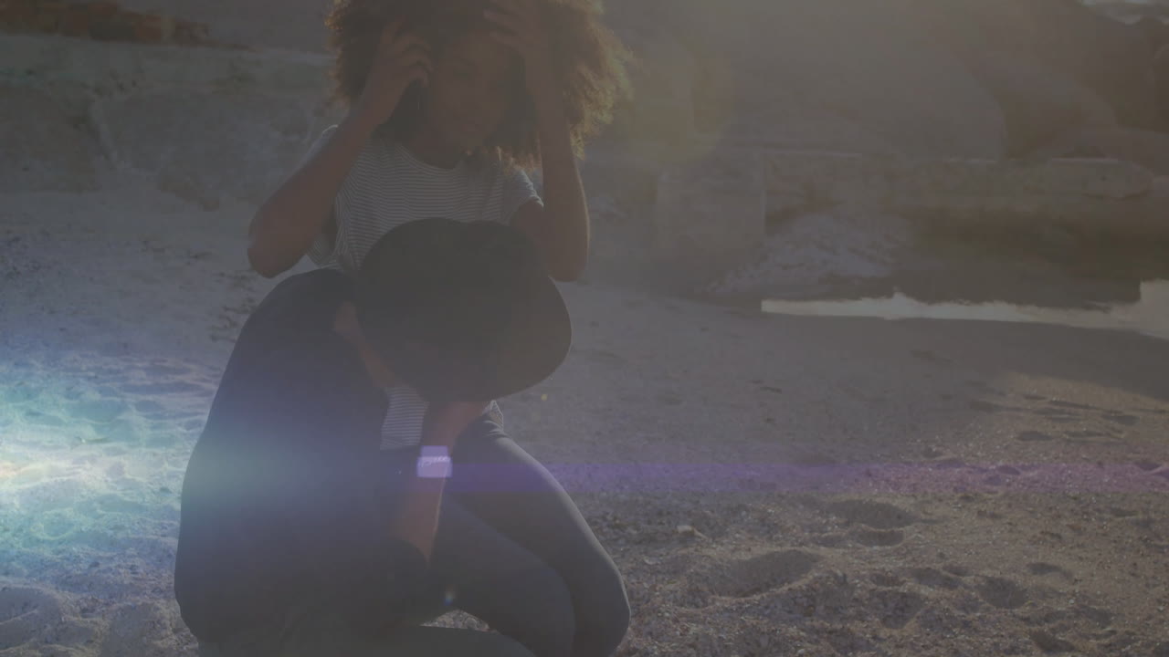 Adjusting hat, woman sitting on sandy beach during sunset animation scene