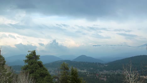 Stormy-clouds-building-during-a-timelapse,-spring-weather,-viewing-the-Lost-Creek-Wilderness-and-Green-Mountain-in-the-Pike-National-Forest-in-the-Rock-Mountains,-Colorado,-USA