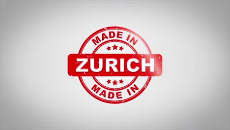 made in zurich signed stamping text wooden stamp animation. red ink on clean white paper surface background with green matte background included.