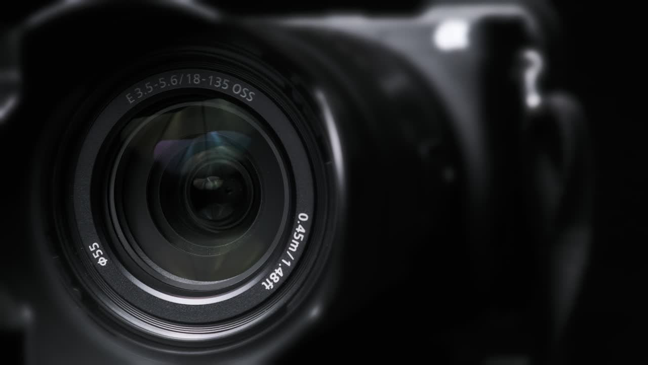 The Camera Lens Rotates, Lights Reflecting Off Glass, Robotic Camera Movement