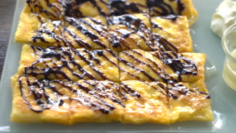 roti with chocolate sauce on plate