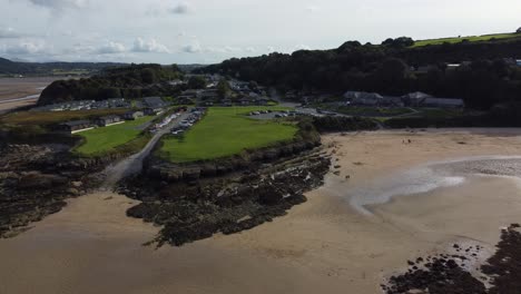 Aerial-view-Red-wharf-bay-sandy-coastal-tavern-restaurant-on-the-isle-of-Anglesey,-North-Wales