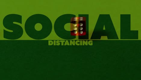 animation of social distancing text over two dice on green background