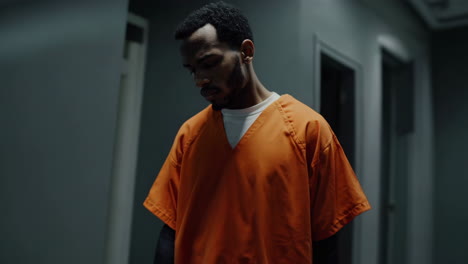 prisoner in holding cell