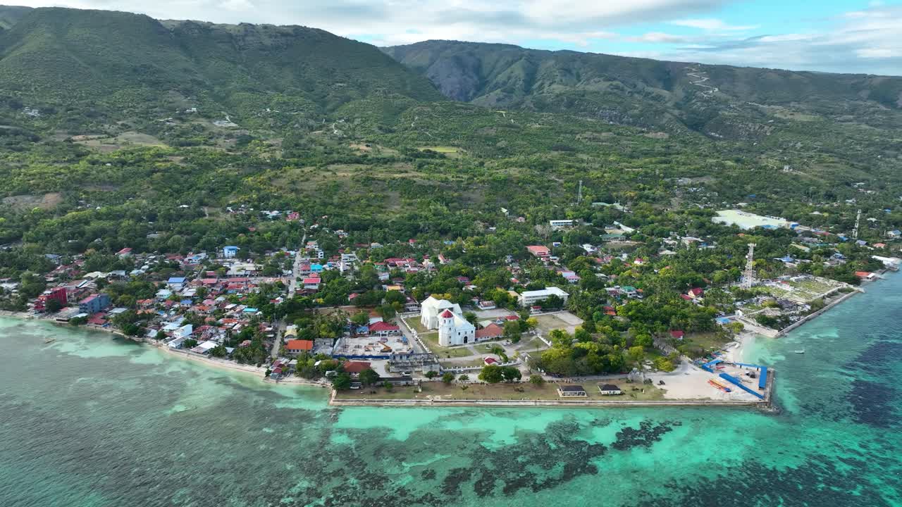 Historical Landmarks In Oslob Town On Shoreline Of Cebu In Philippines. aerial shot