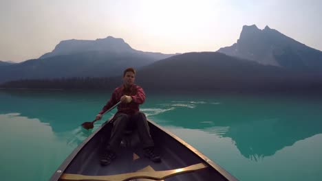 man travelling on boat in lake 4k