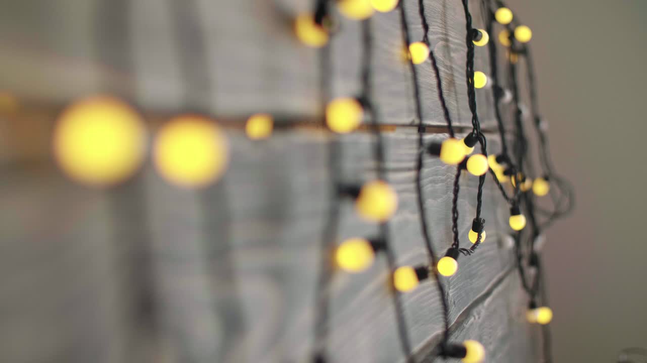Wooden background with christmas lights