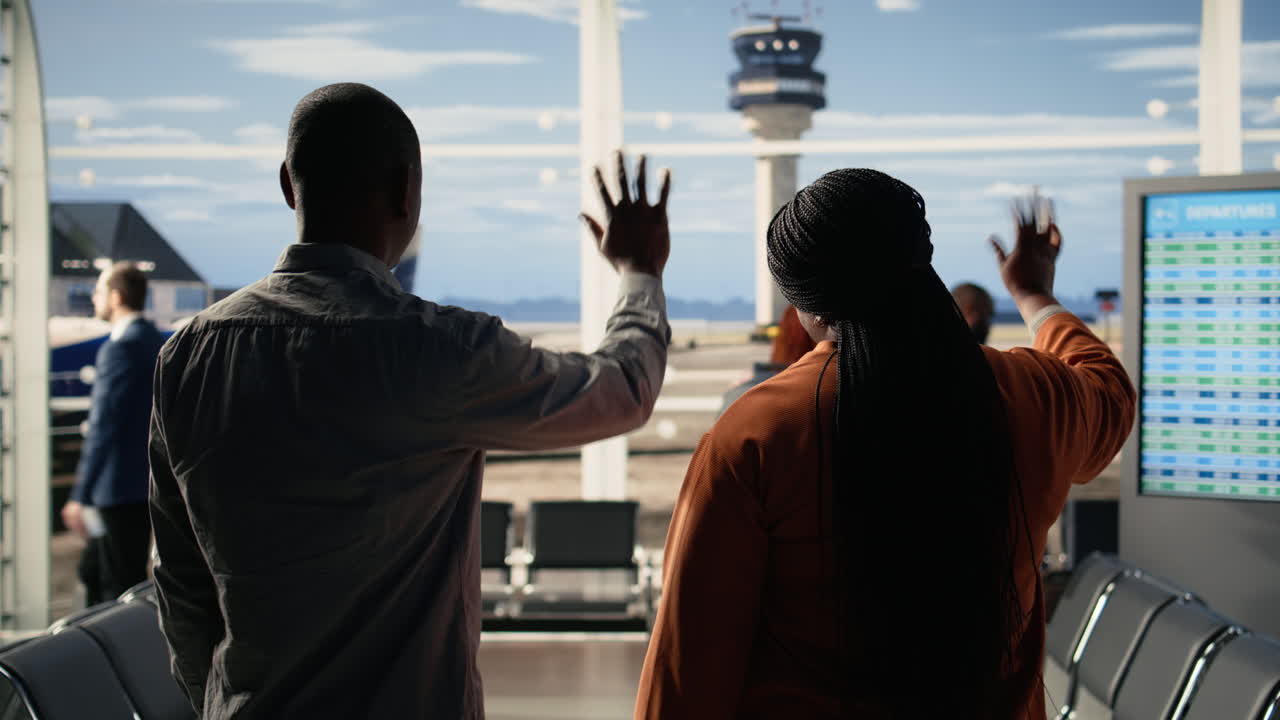Waving goodbye at airport, sad mother and father, daughter studying abroad