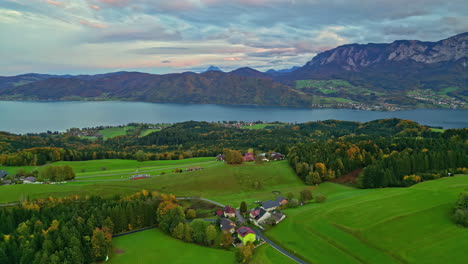 aerial view showing panoramic view over austrian alps and lake