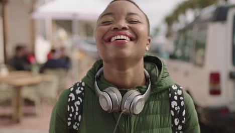 portrait-of-young-beautiful-african-american-woman-laughing-happy-on-beachfront