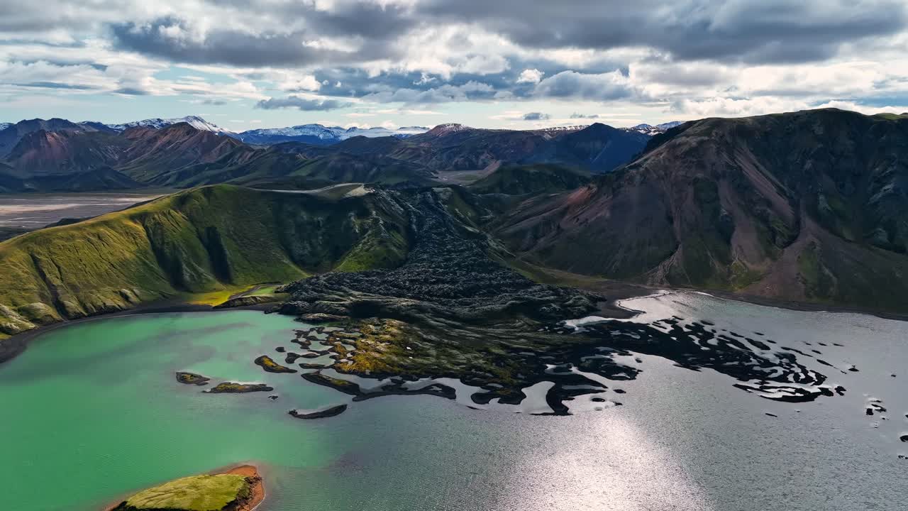 Aerial View of Volcanic Landscape with Lake and Mountains