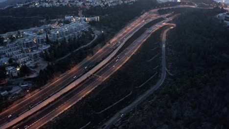 highway through residential area at dusk