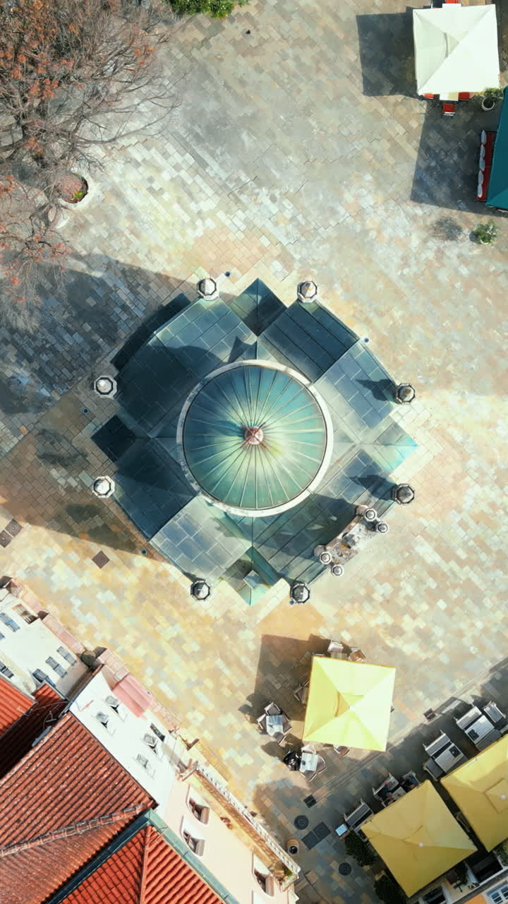 Aerial, drone view of buildings in Montenegro, in daylight. Vertical