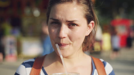 beautiful woman portrait at fare market looking at camera