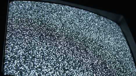 TV-static-and-noise-glitch-on-VCR-television-screen-with-bad-signal