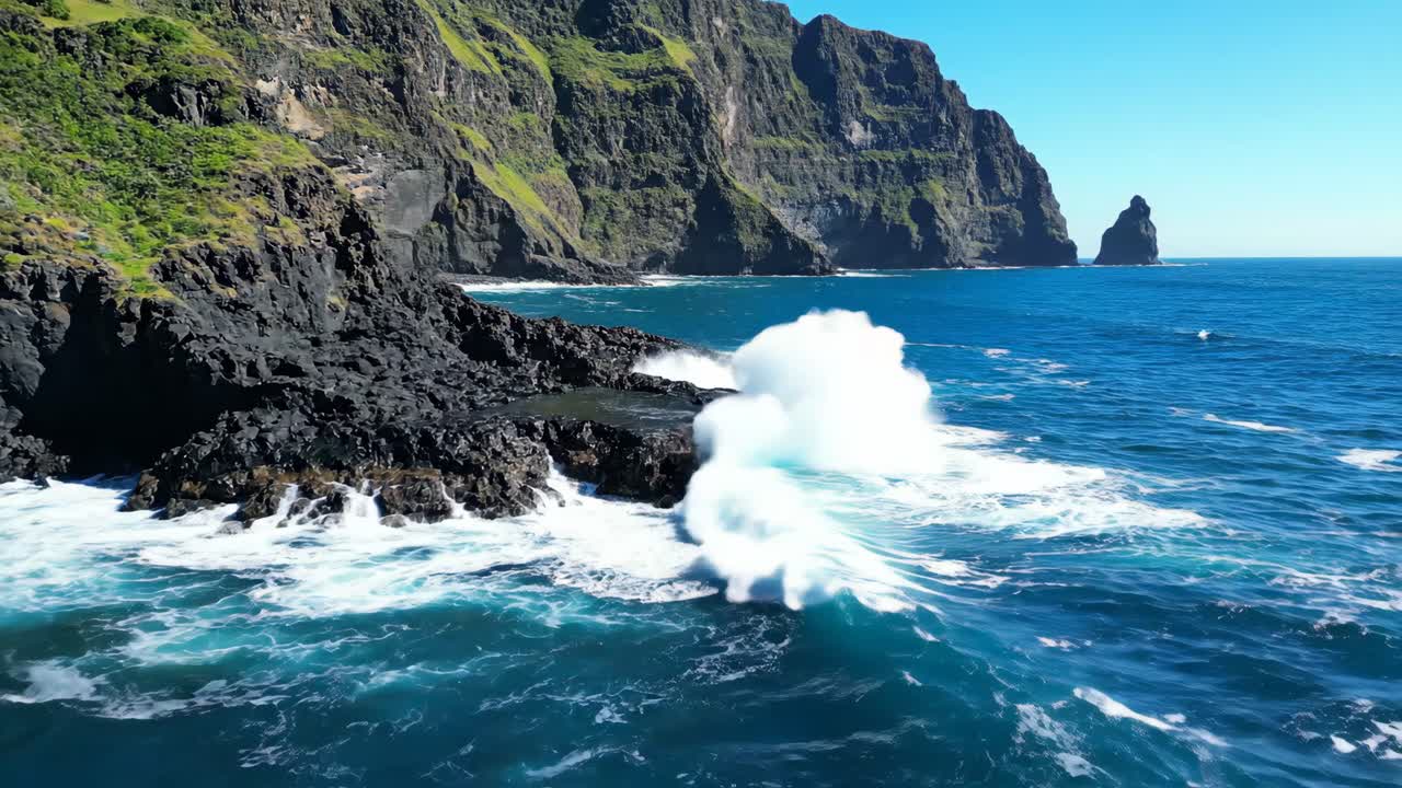 Scenic Ocean Coastline with Waves Crashing on Rocky Cliffs