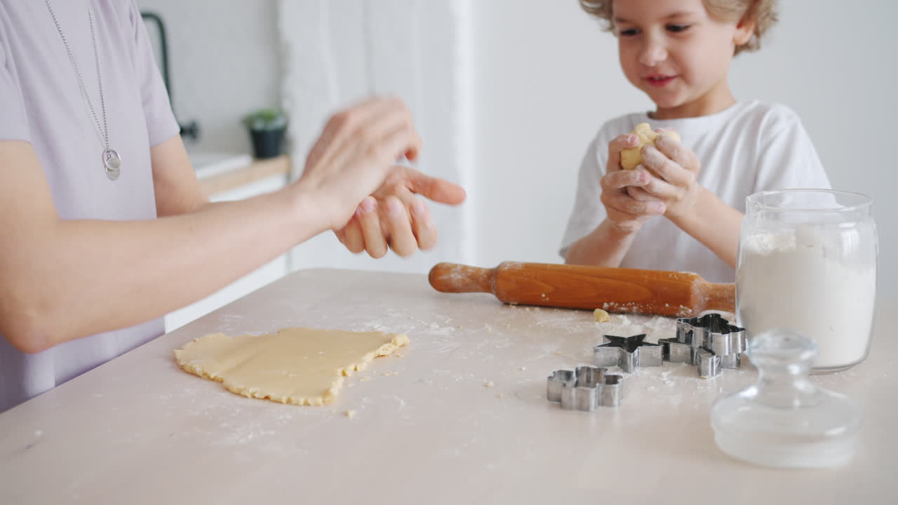 Mother and child baking cookies