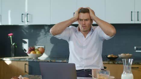 Business-man-shocked-in-new-kitchen