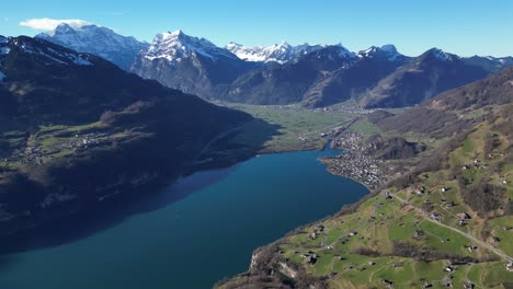 Bright-beautiful-sunny-day-above-Lake-Walen-in-Walensee-Switzerland-with-snow-covered-mountains