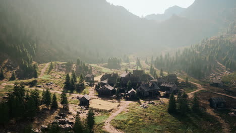 Old-wooden-village-on-the-rocky-mountain-background
