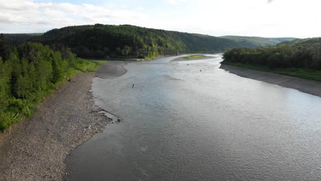 Fly-Over-Drone-Footage-of-fly-fishing-at-Restigouche-River,-New-Brunswick,-Canada