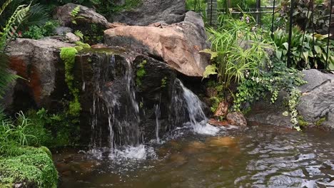 Waterfall-within-Duthie-Park,-Aberdeen,-Scotland,-United-Kingdom