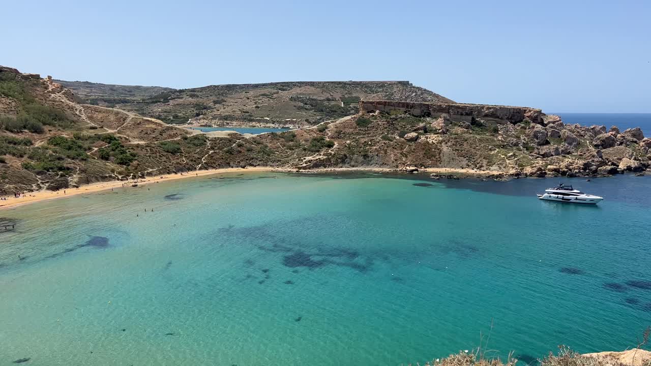 Beautiful beach and lagoon in Malta, with turquoise Mediterranean sea
