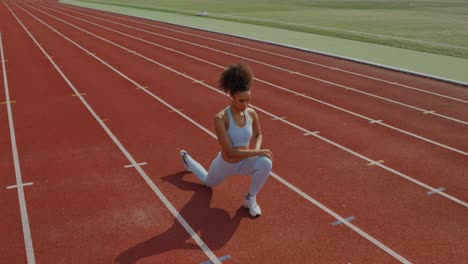 woman training on running track