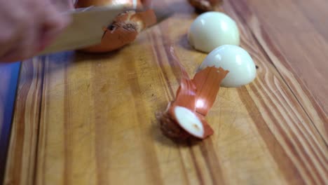 slicing onion chopping into julienne on wooden board kitchen healthy healthy diet