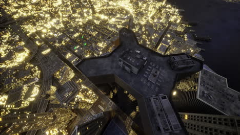 city skyline illuminated at night with star shaped rooftop structure