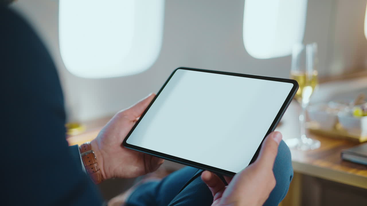 Analyzing Stock Market Data on a Tablet During a Flight