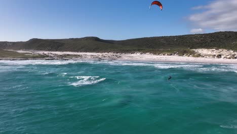 kiteboarding at a beautiful coastal beach